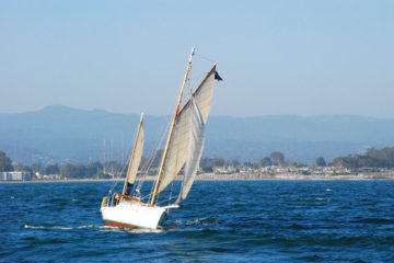 yacht-sailing-away-from-shore